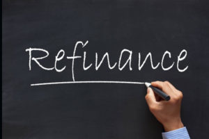 refinance word written on a blackboard