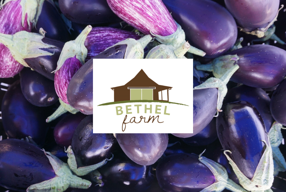 Bethel Farm logo with an eggplant backgorund